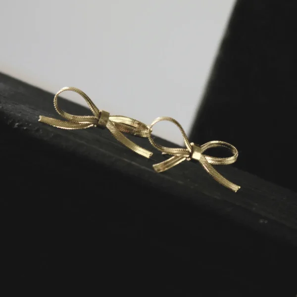 Ribbon Knot Bow Gold Earrings Front Image