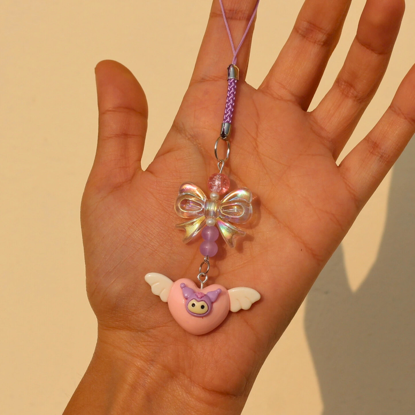 Kuromi Heart Angel Phone Charm in Hand Overview Image