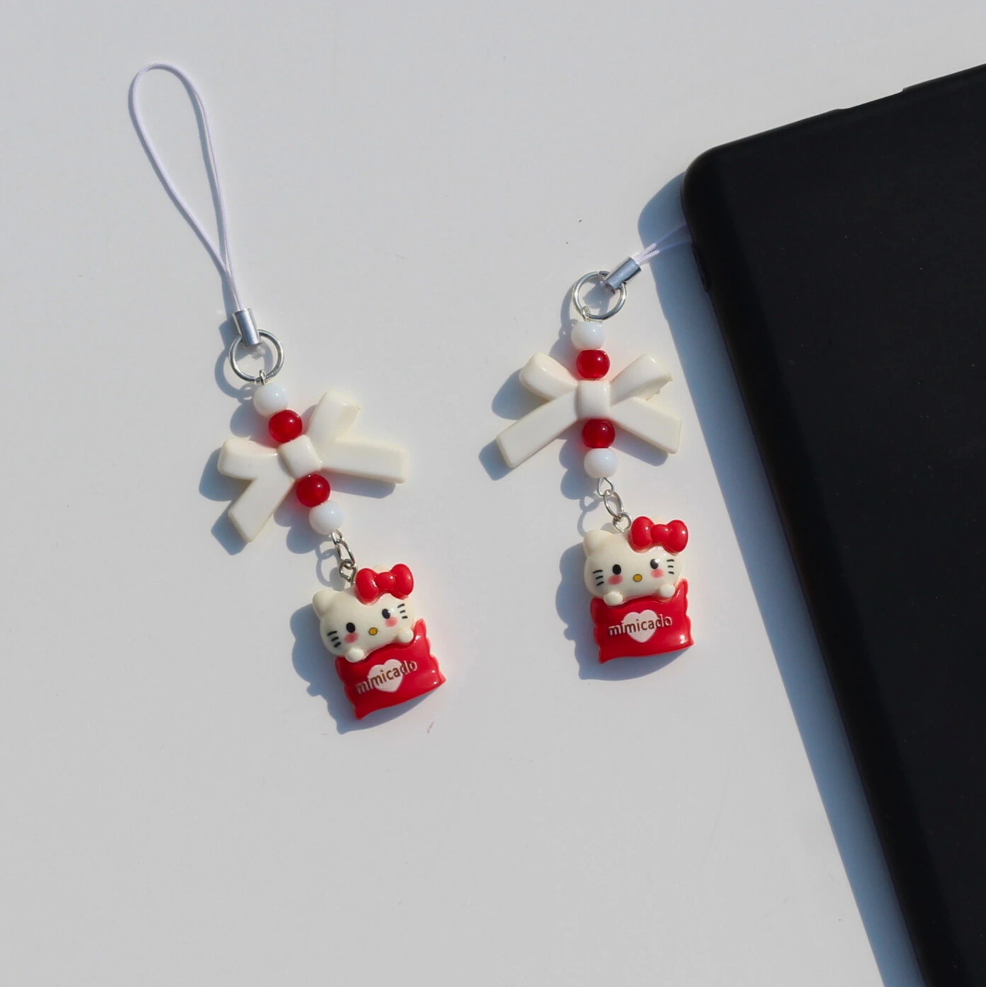 Hello Kitty Cup Cake Phone Charm in the Phone Overview Image