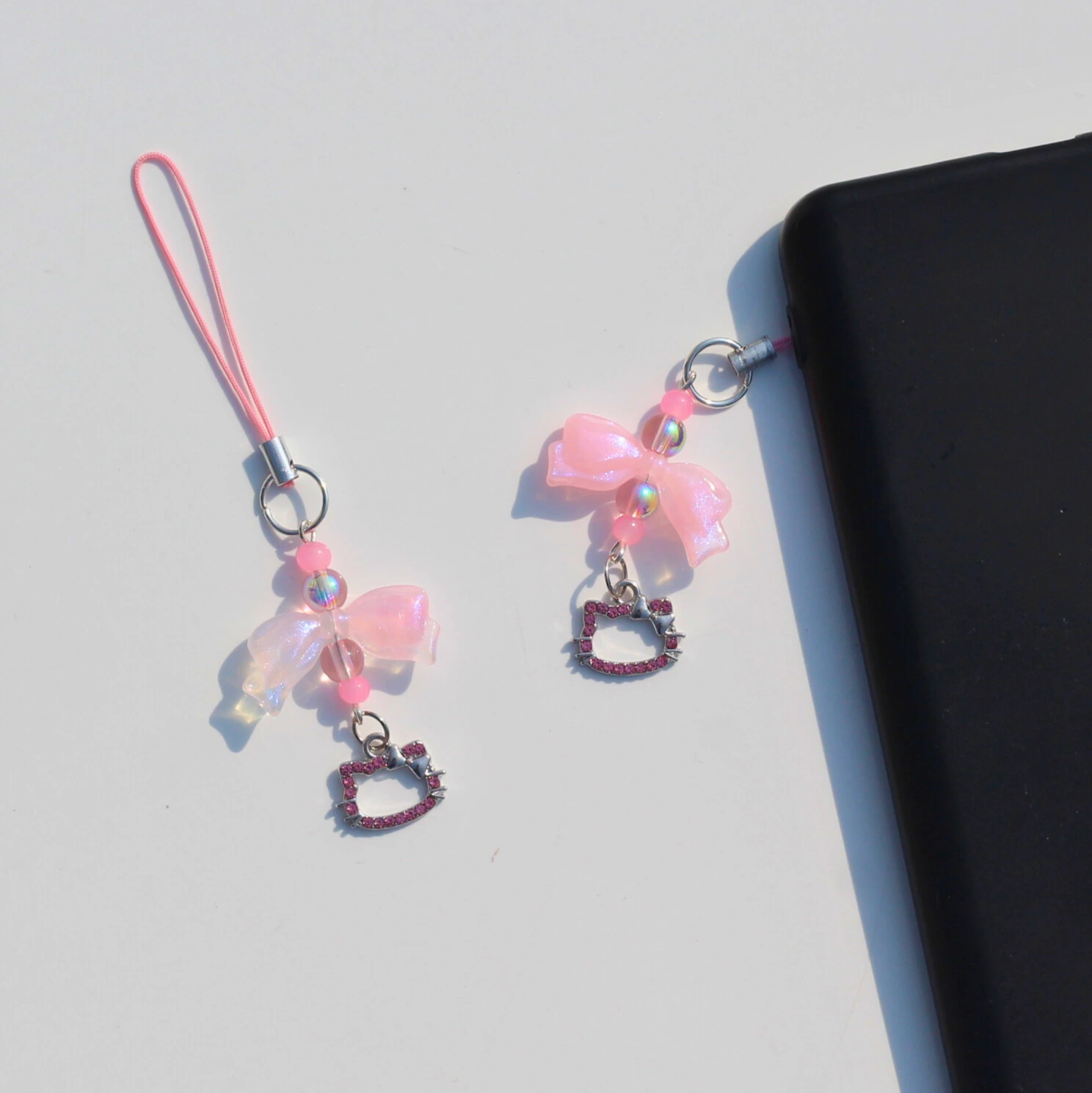 Hello Kitty Pink Rhinestone Phone Charm in the Phone Front Image